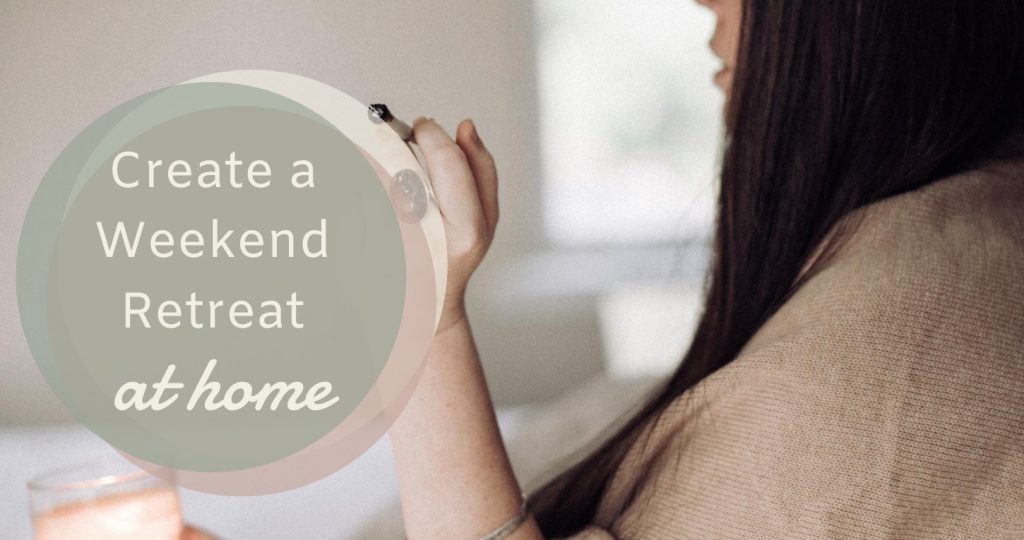 A woman relaxing at home in a soft sweater, with the words Create a Weekend Retreat at Home