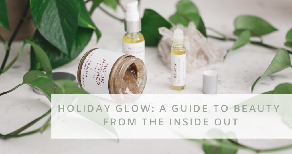 Nourish mask, Glow serum and Renew eye serum among green leaves, with the words Holiday Glow: A Guide to Beauty from the Inside Out