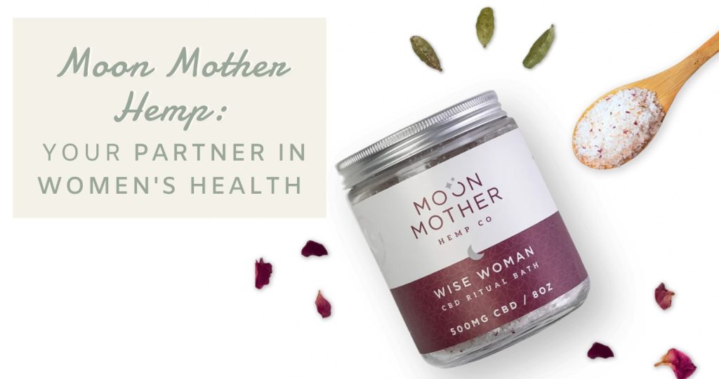 Wise Woman CBD Ritual Bath jar with rose petals and cardamom, with the words Moon Mother Hemp: Your Partner in Women’s Health